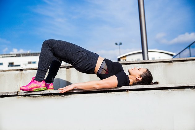 Sporty woman doing Bridge exercise
