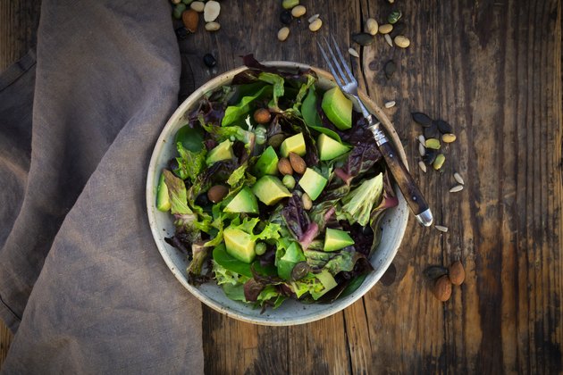 Salad with avocado, almonds and soy beans and seed for healthy hair