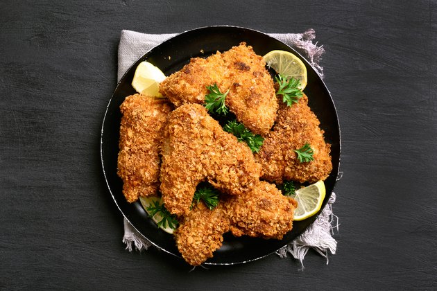 Crispy chicken wings on a plate.