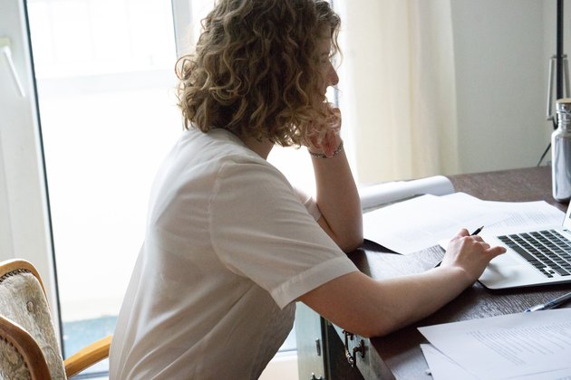 Young woman working at home