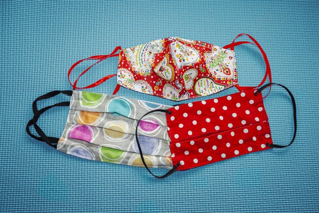Self Made Colorful cloth face Masks on a Blue Background