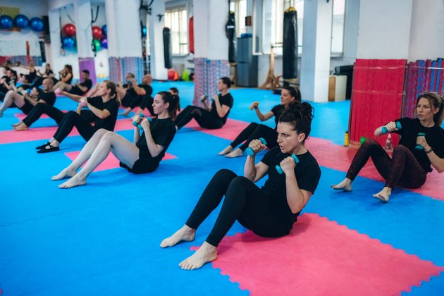 Fitness group doing abs
