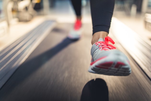 Close-up of Athlete shoes while running on treadmill