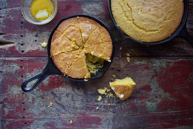 homemade corn bread in cast iron pan flat lay