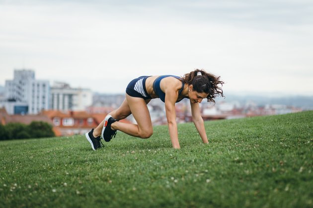 Female athlete doing burpees