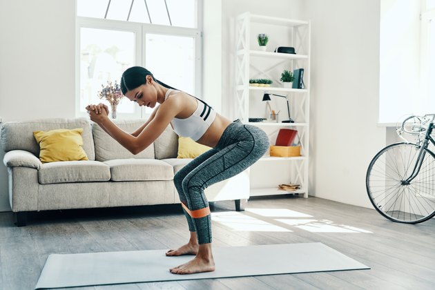 Woman doing a butt and ab workout at home