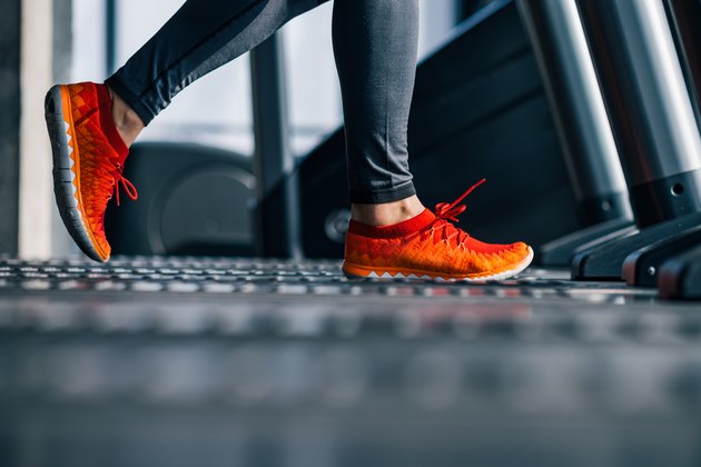 Running on treadmill in the gym.