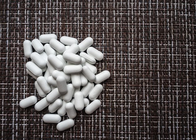 Scattered white vitamins