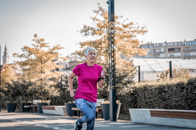 Woman jogging at average 5K pace outside