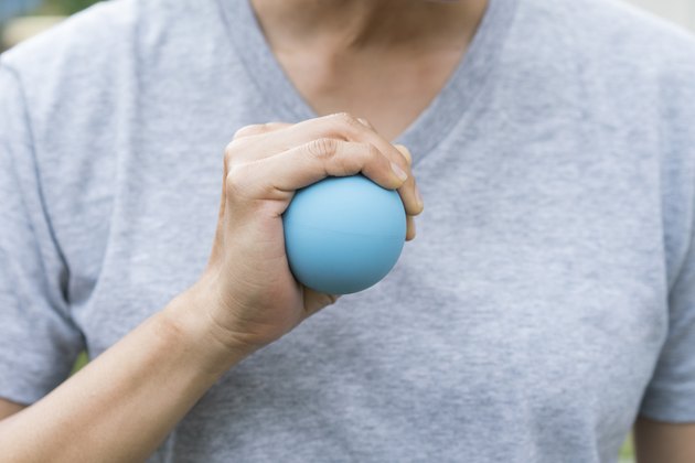 woman hand holding a stress ball