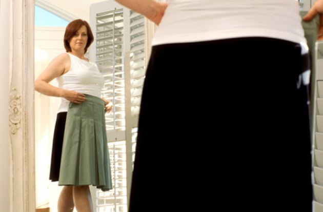 Woman trying on clothes