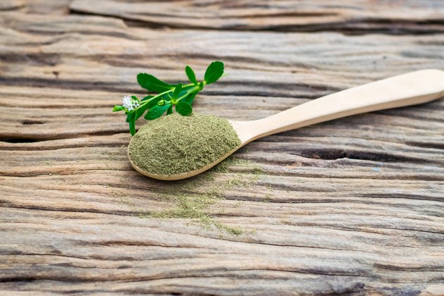 Stevia powder in wooden spoon