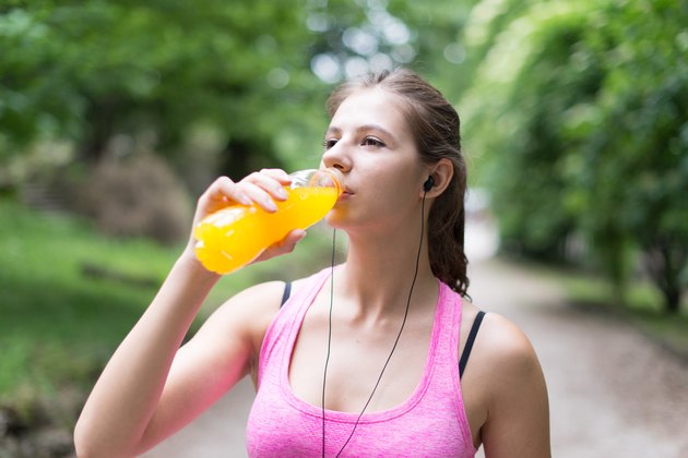 Woman drinking after sport