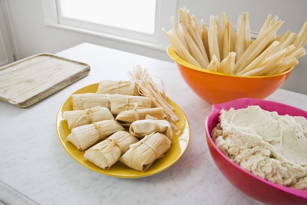 Tamales, corn husks, and masa