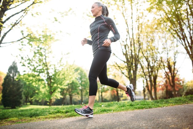 Mature Woman Jogging Outdoors