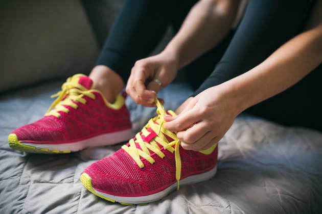 Young woman getting ready for training
