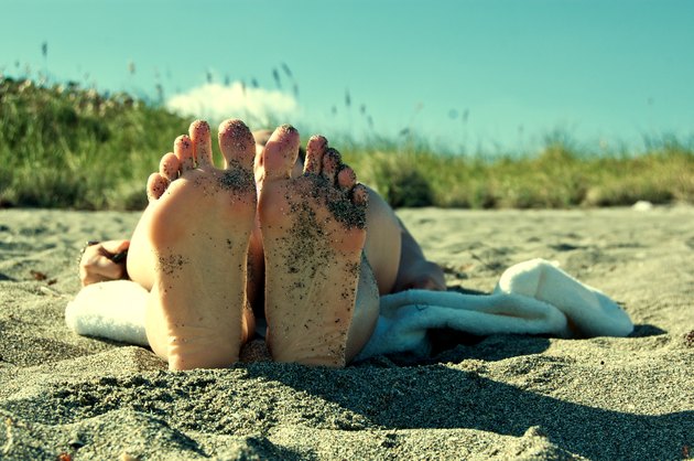 Bottom of feet on Blowing Rocks Beach