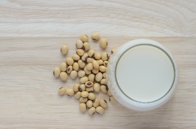 Fresh Soy milk in a glass and soybean seeds