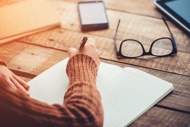 Planning new day in journal