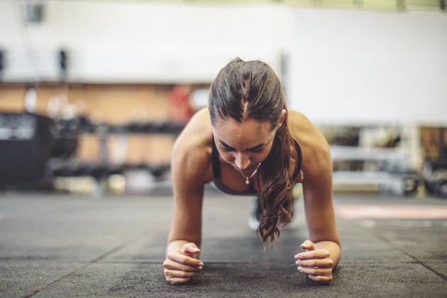 Young woman is doing exercise