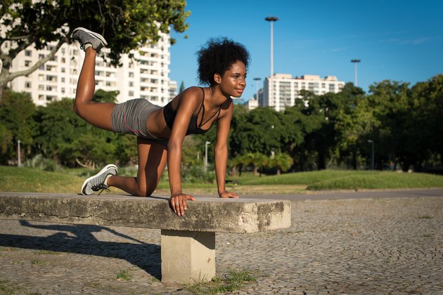 Fitness Woman Doing Glute Kickbacks During a Butt Workout