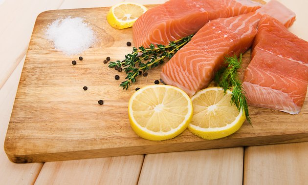 Fresh raw salmon on a wooden chopping board