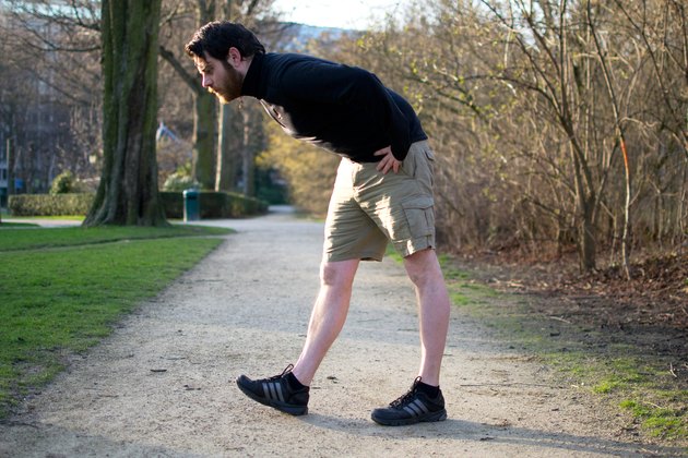 Man performing heel-toe walks before a bike ride