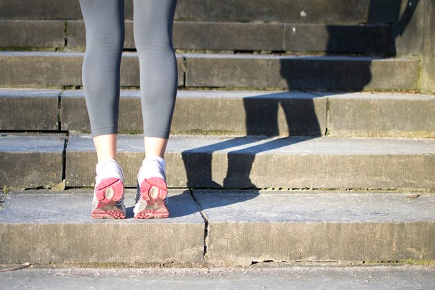 Woman doing Calf Raises before her run