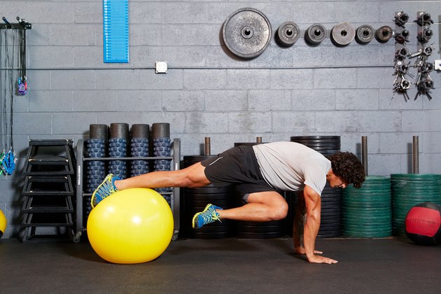 Man doing an ab exercise on a Swiss ball