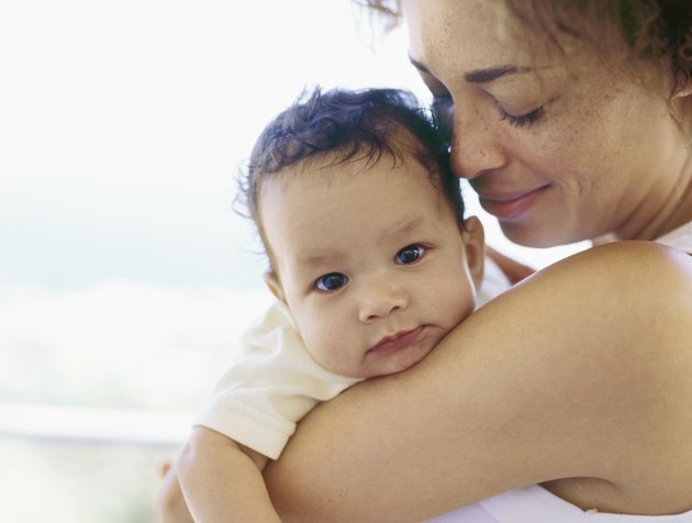 Close-up of a mother holding her baby boy