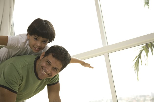 Father playing with son (8-9)