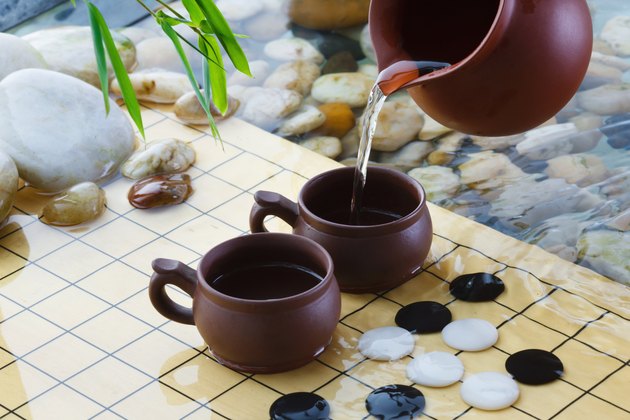 "Tea set and weiqi,close-up"