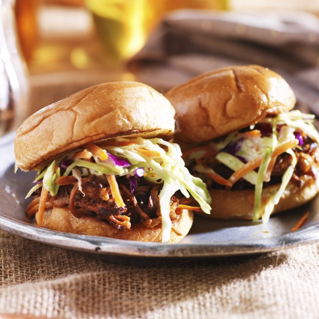 pulled pork sandwiches with bbq sauce and slaw