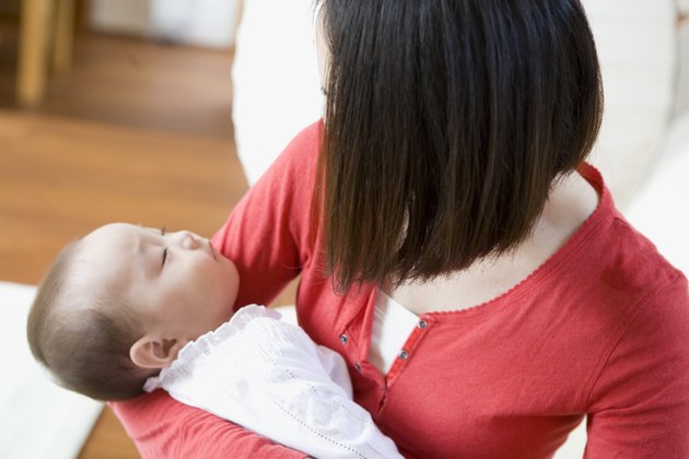 Mother Holding Baby Girl