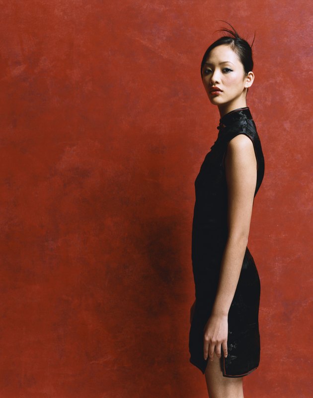 Studio Portrait of a Woman Wearing a Black Mini Dress