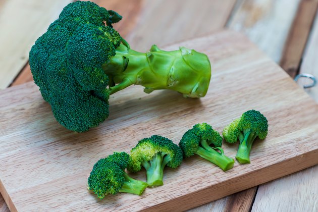 Fresh broccoli on wooden background,broccoli wooden table