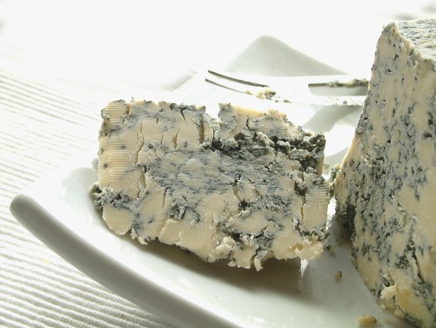 stilton cheese on white platter