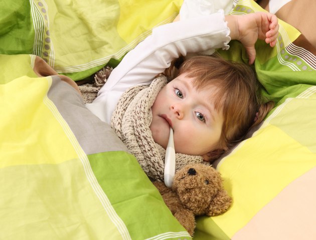 Little girl lying sick