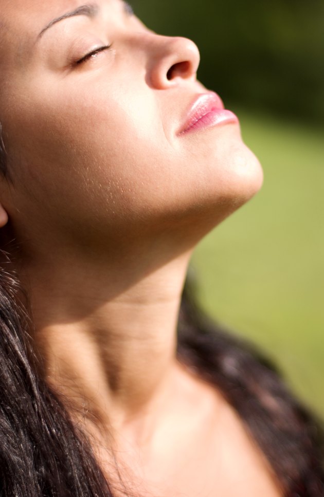 Woman with face to the sky