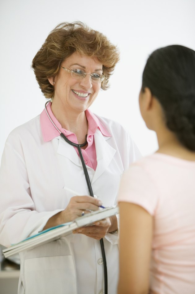 Female doctor talking to a patient