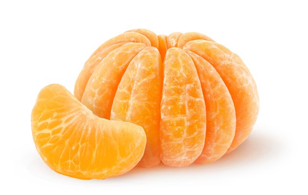 Peeled tangerine isolated on white