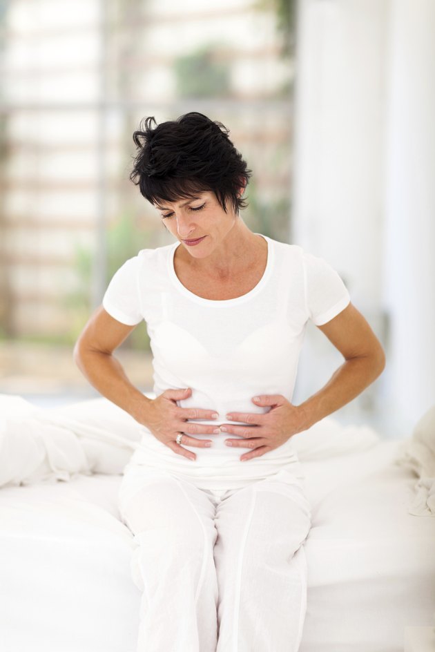 middle aged woman having constipation