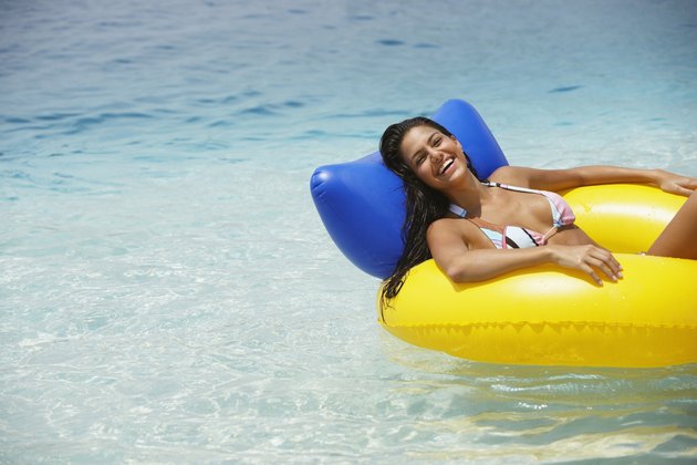 South American woman in raft