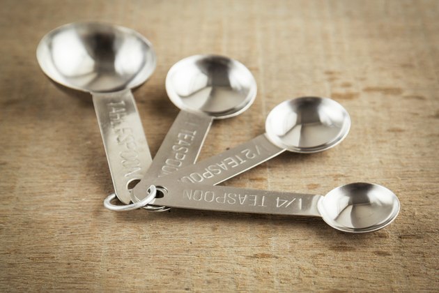 Measuring spoons on wooden table