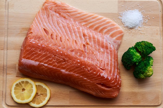 Raw salmon with broccoli, lemon and salt.