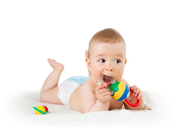 Baby holding a toy