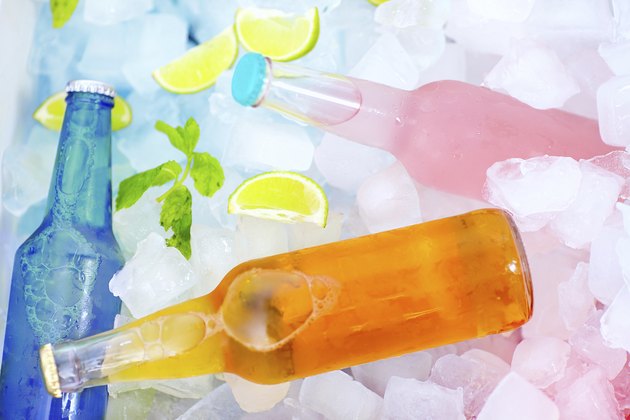 chilled colorful beverages in ice box. summer party