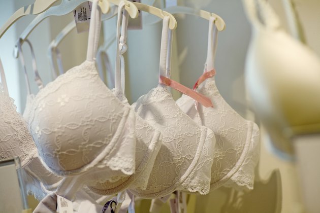 Row of bras hanging in store