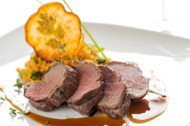 Roasted deer with smashed sweet potatoes and chips