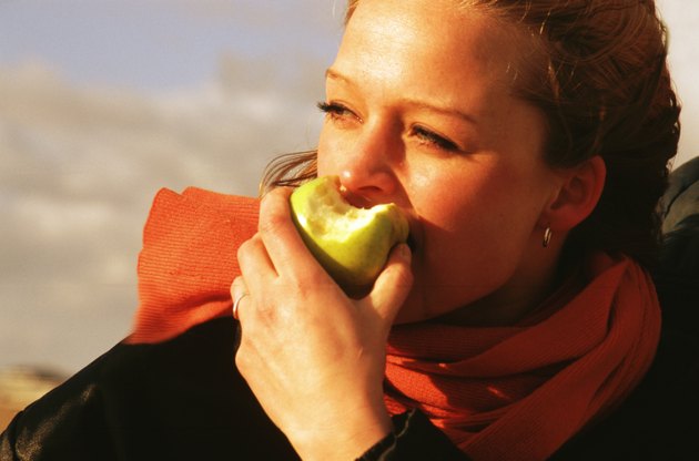 woman eating an apple
